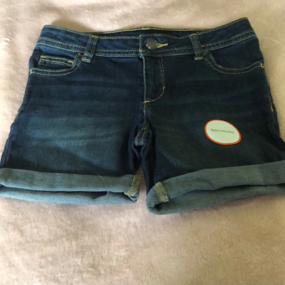Worn Dark Blue Jeans w/ tags.